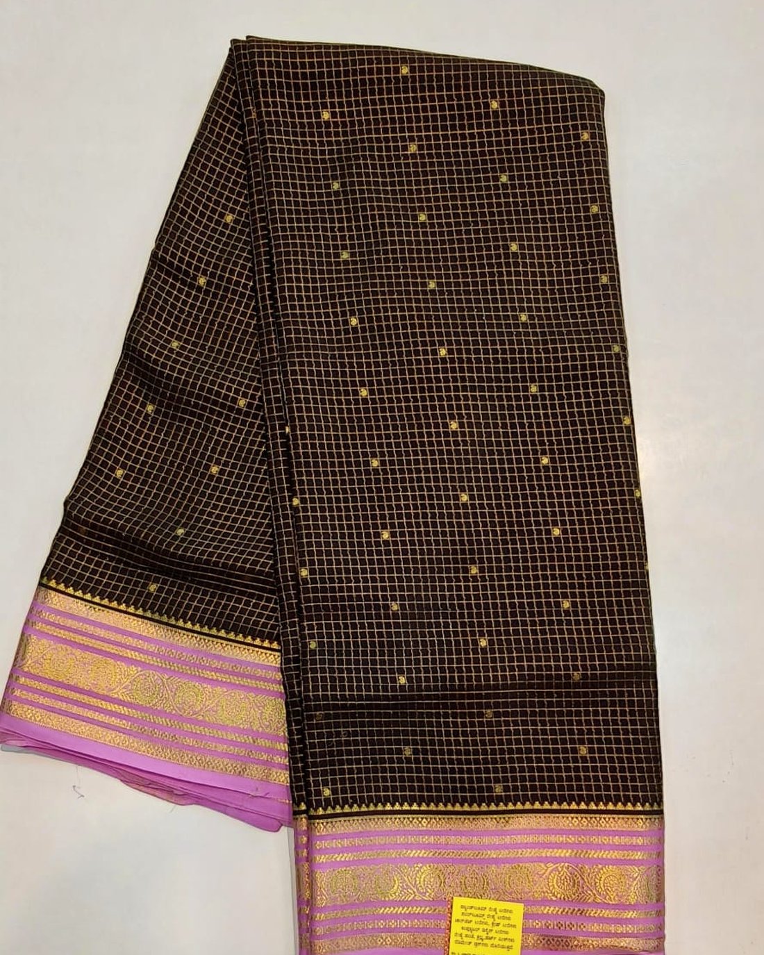 Black pure Mysore silk crape saree with gold butta checks and lavender zari border